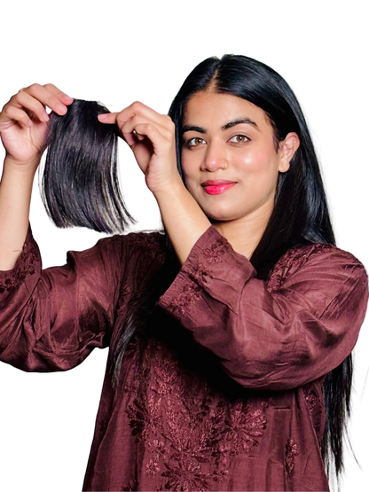 Woman holding a curtain bangs on a white background