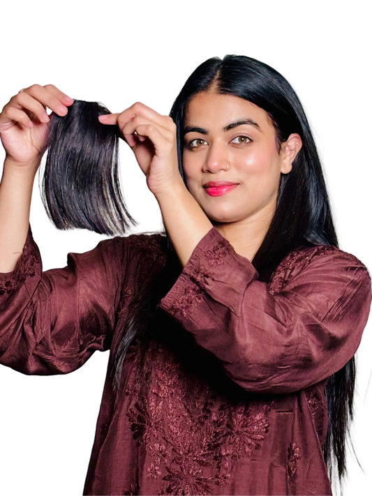 Woman holding a curtain bangs on a white background