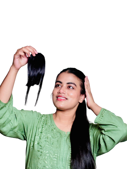 Woman holding a hair bangs with fringes with a plain background